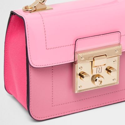 Pink lock front mini satchel cross body bag